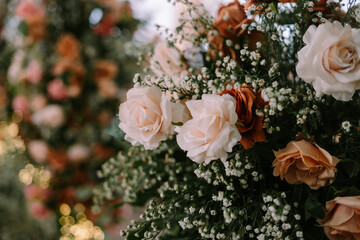 A close-up of artificial decorative flowers arranged beautifully, perfect for weddings, events, or home deco
