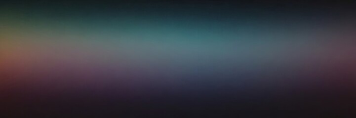 Obraz premium A blurry image of a dark blue background with a purple and green hue