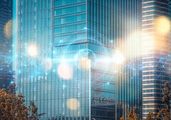 A modern glass building with a digital overlay of a glowing globe and network lines.