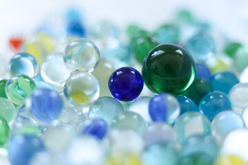 Colorful marbles close-up photography. Selective focus.	