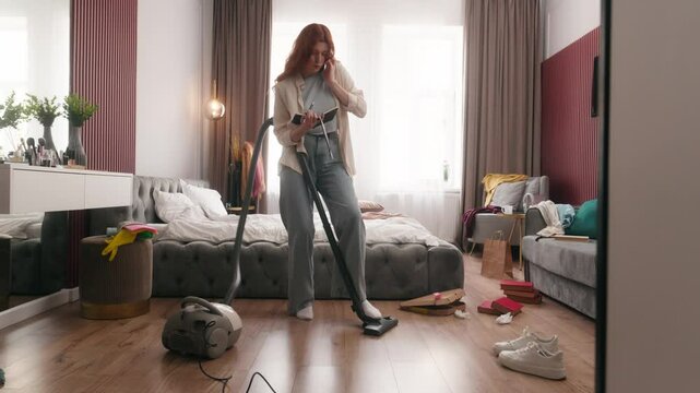 Mess in bedroom home cleaning stressed busy woman girl lady female housewife homeowner vacuum cleaner housekeeping chores multitasking businesswoman clean talk phone write notes stress rush deadline