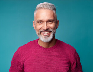 Obraz premium Headshot Portrait of a Smiling Older Man with Contemporary Style, Isolated on Color Background with Ample Copy Space