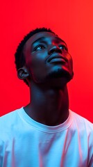 Stylized portrait of African man with calm expression and dramatic lighting