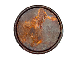 an old rusty can lid isolated by a white background