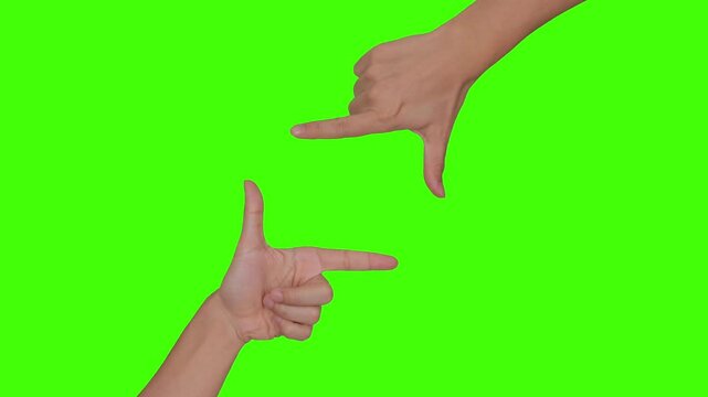 Hand making a picture frame symbol