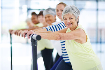 Barre, fitness and health with portrait of women in studio for club, stretching and ballet exercise. Pilates, wellness and strength training with people in class for balance, workout and diversity