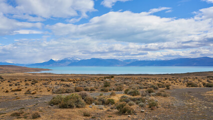 Lago Argentino, located near El Calafate, Argentina, surrounded by the stunning Patagonian landscape. The lake’s vibrant turquoise waters are fed by glaciers in Los Glaciares National Park.
