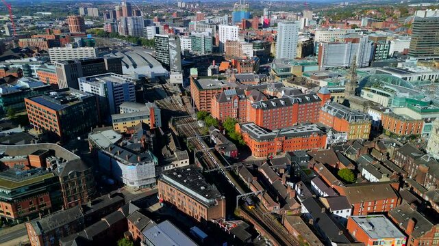 Aerial video of a train approaching Leeds train station in England  UK 
