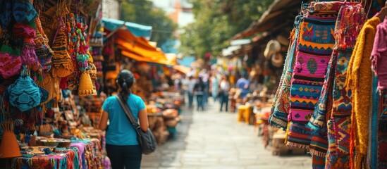 A woman walks through a bustling market filled with colorful textiles and handmade goods.