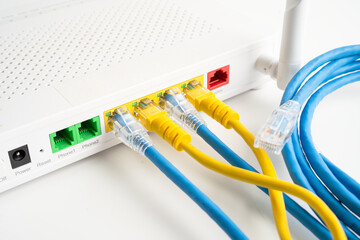 Ethernet cable with wireless router connect to internet service provider internet network.