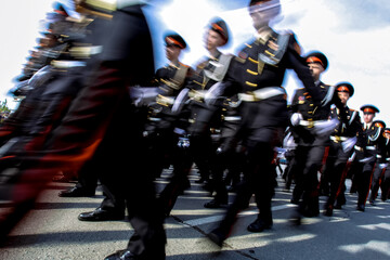 young military cadets marching in the square. blurred frame