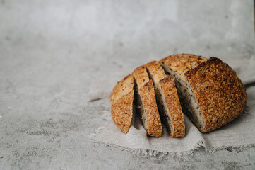 Traditional sourdough bread on a gray background	
