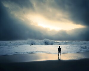Solitary Figure Gazing at Moody Ocean Sunset on Deserted Beach
