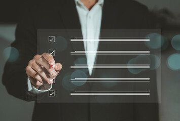 Checklist concept, Survey concept, Questionnaire with checkboxes, Online survey filling, Quiz question answering, Businessman checking checkboxes on virtual screen.