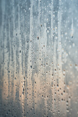 Ice patterns on glass window, selective focus.