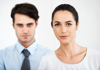 Woman, portrait or coworker in studio for business, ambition or management role in company. People, colleagues or confident on white background for job opportunity, professional attitude or assertive