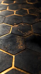 A close-up of the hexagonal tiles on a floor, each tile made up of gold and black metal, against a dark background