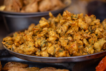Potato pakora or aloo paroka on plate. Selective focus.