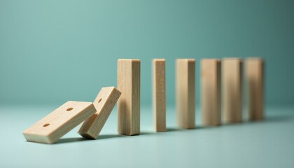 Wooden Blocks Toppling Over Creating Domino Effect