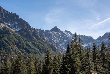 Morskie Oko, a breathtaking alpine lake in the Tatra Mountains near Zakopane, captivates with its crystal-clear waters and surrounding peaks. 