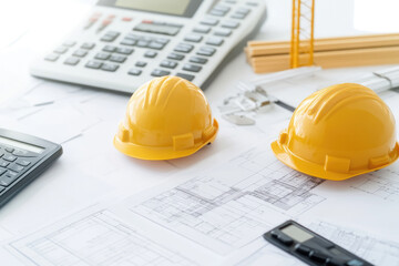 Business meeting with architecture and engineering teams discussing construction progress and design collaboration in a modern office space