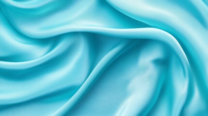 Soft, flowing blue silk fabric backdrop with elegant waves and a luxurious sheen, perfect for fashion or romantic decor