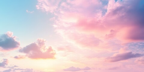 Obraz premium Pink and blue sky with fluffy clouds.