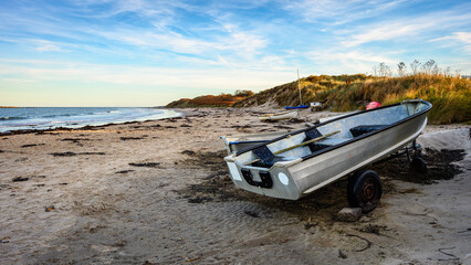 Boats on Low Newton Sandy Beach, also known as Low Newton-by-the-sea it is a small fishing village...