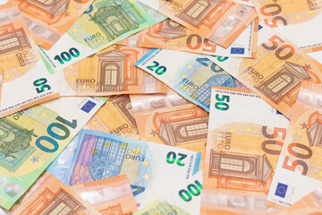 Different Euro Banknotes Money Background. Euro Money Currency. Colored Paper Money. A Lot of Fifty Euro Bills. Business, Finances, Cash and Money Saving Concept
