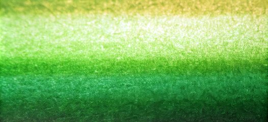 A gradient of green hues transitions smoothly from light to dark, creating an impression of depth and contrast. The colors flow horizontally, evoking a sense of calm and serenity.AI generated.