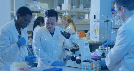 Image of network of connections over diverse scientists working in lab