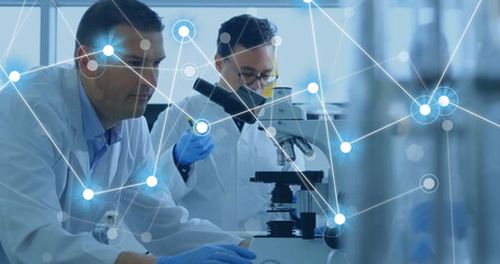 Image of network of connections over diverse male scientists working in lab