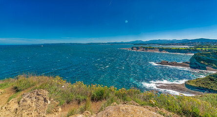 Fototapeta premium view from the sea, El Faro de Cabo Mayor, Santander, September 2024, Cantabria, Spain, Europe,