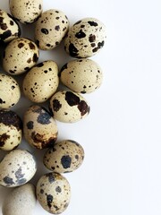 Quail eggs isolated on white background with copy space. Eco product. Diet food.