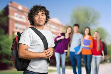Obraz premium Young student at university building background