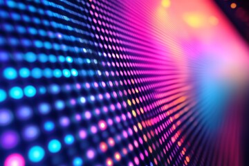 Obraz premium Close-up of a colorful LED light display with blurred background.