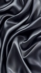 Obraz premium Black satin fabric, rippled and smooth, a luxurious backdrop for elegant fashion displays