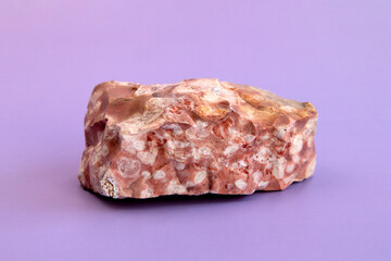 Pelitic Schist Rock isolated on on light purple Background