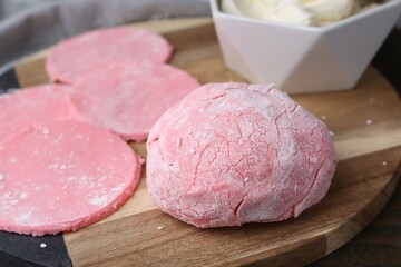 Dough for tasty homemade mochi on wooden table, closeup