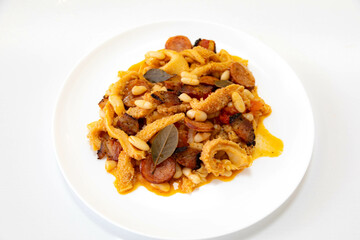 Beef tripe (bucho), beef stomach, tripe on a white plate. Dobradinha