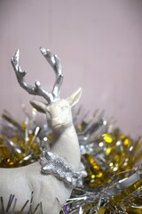 christmas arctic reindeer decor ornament in gold metalic background and glitters