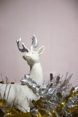 christmas arctic reindeer decor ornament in gold metalic background and glitters
