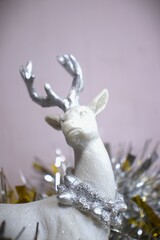 christmas arctic reindeer decor ornament in gold metalic background and glitters