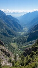 Obraz premium A stunning view of a deep valley surrounded by lush, green mountains under a bright blue sky.