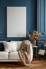 Scandinavian interior design of modern living room. Sofa against navy blue wall with blank mock up poster