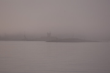 ship in the foggy sea at the morning 