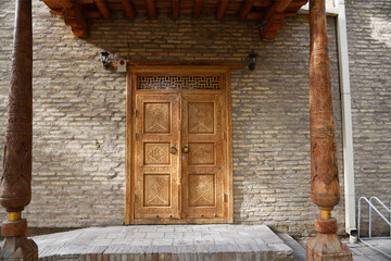 Besh Khovli palace. wooden carved door. Khiva. Uzbekistan