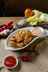 Indonesian snack appetizer deep fried tempe chicken calamari golden brown