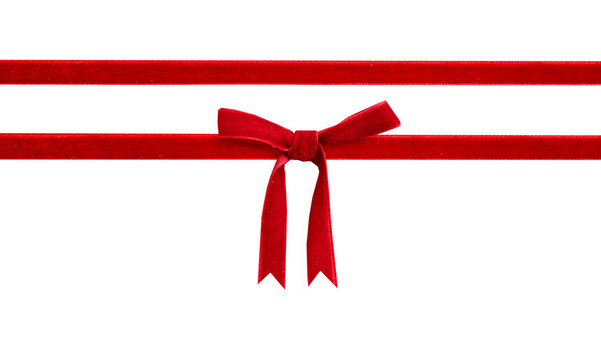Red velvet bow and ribbon isolated on white. Gift box decor, Christmas design element.