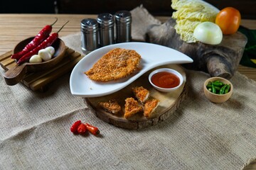 Indonesian snack appetizer deep fried tempe chicken calamari golden brown